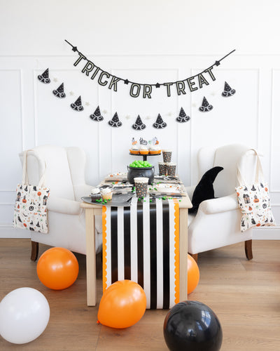 Orange and Black Striped Paper Table Runner