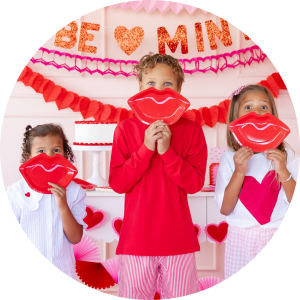 Scattered hearts, XOXO banners, lips, & bold pops of pink