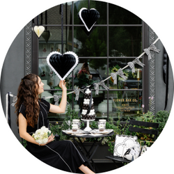 Classic black and creamy white tones with bold hearts